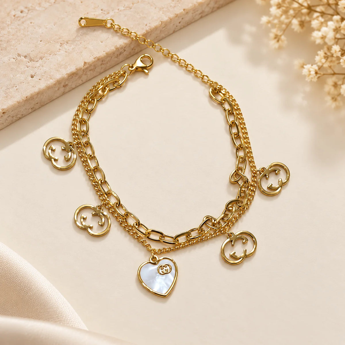 White Heart Medallion Two-Layer Gold Charm Bracelet
